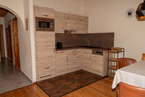 a kitchen with a sink and a counter top at Ferienparadies Truppe in Velden am Wörthersee