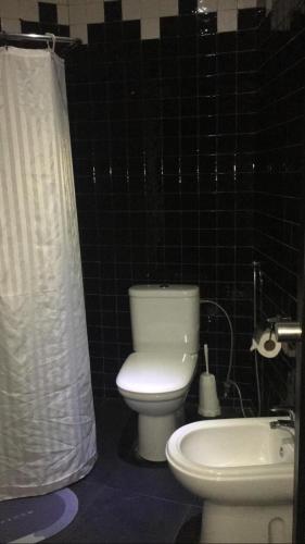 Koupelna v ubytování Hôtel Texuda