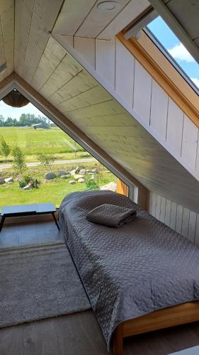 Cama o camas de una habitación en Pieni Mökki