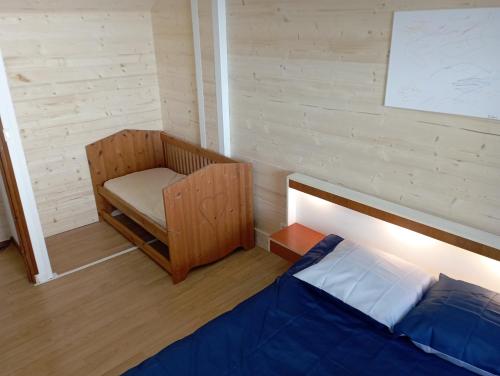 Postel nebo postele na pokoji v ubytování Le petit Yves