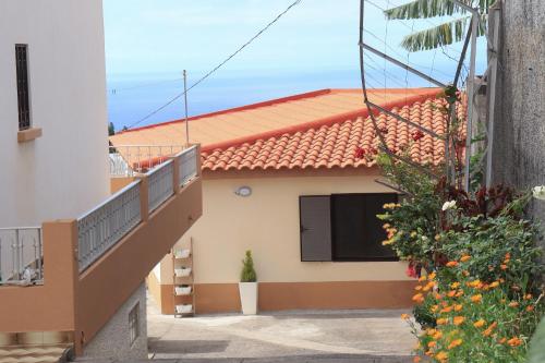 a view of a house with a balcony at Brooklyn&Fennel House in Funchal