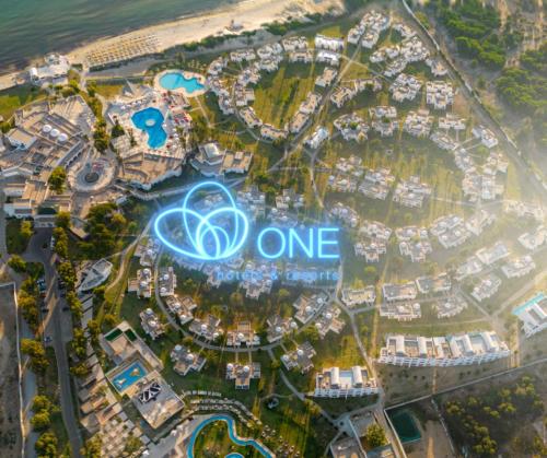 an aerial view of a city with the olympic sign at One Resort Aqua Park in Monastir
