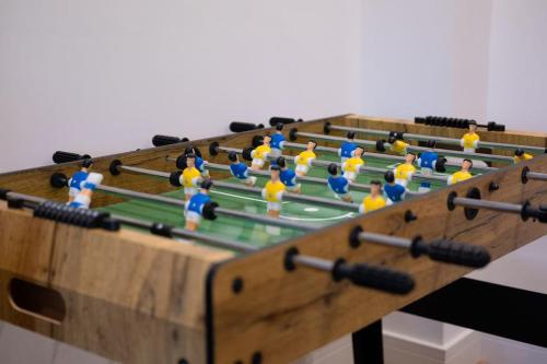 a model of a pool table with people in it at Brand New Barn Conversion in Kings Bromley