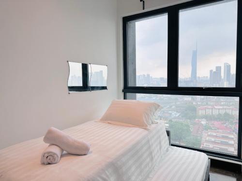 Ένα ή περισσότερα κρεβάτια σε δωμάτιο στο V Residence Suites-27