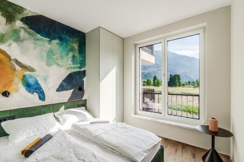 Ένα ή περισσότερα κρεβάτια σε δωμάτιο στο Apartment Hajdi with Sauna & Garage