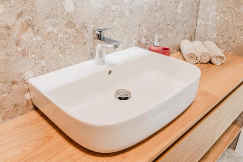 Ένα μπάνιο στο Apartment Hajdi with Sauna & Garage