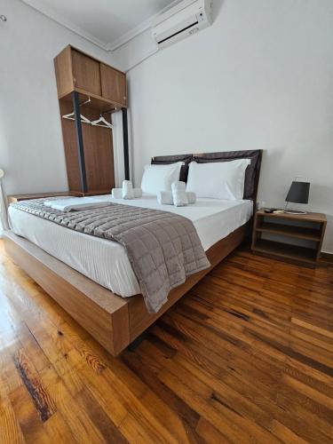 Ένα ή περισσότερα κρεβάτια σε δωμάτιο στο Koukoufli Penthouse 2BDS