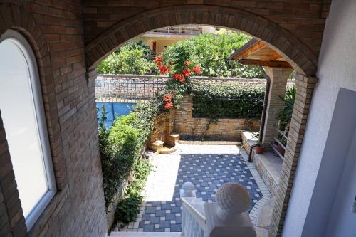 an overhead view of a courtyard with a swimming pool at Villa Lejzo - Swimming Pool in Berat