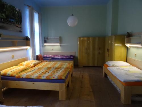Postel nebo postele na pokoji v ubytování PrimaByt