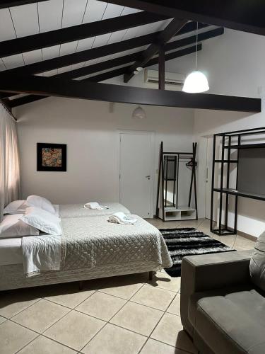 Katil atau katil-katil dalam bilik di Hotel Vila Germânica