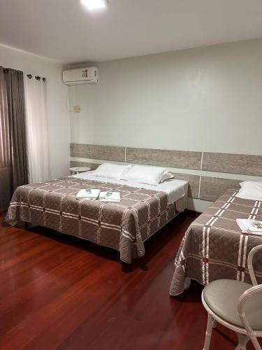 Katil atau katil-katil dalam bilik di Hotel Vila Germânica