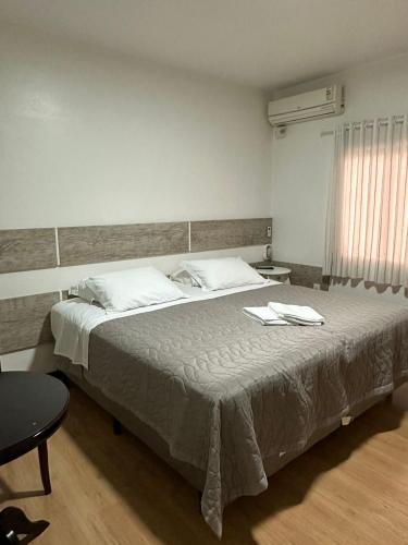 Katil atau katil-katil dalam bilik di Hotel Vila Germânica