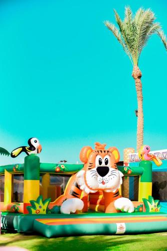 a toy tiger on a inflatable ride at a water park at Tropitel Sahl Hasheesh in Hurghada