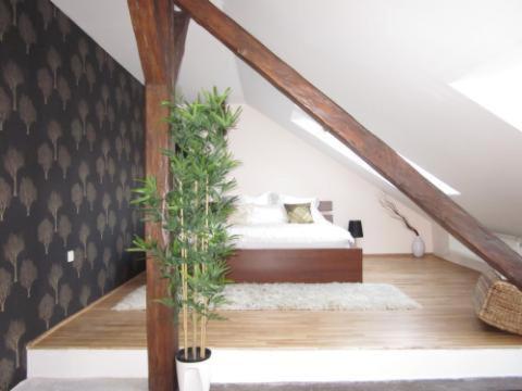 Ένα ή περισσότερα κρεβάτια σε δωμάτιο στο Prague City Loft And Studio