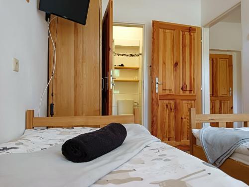 Postel nebo postele na pokoji v ubytování SPA Pod Javory