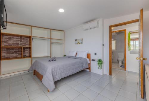 Ένα ή περισσότερα κρεβάτια σε δωμάτιο στο Dream Seaview Loft