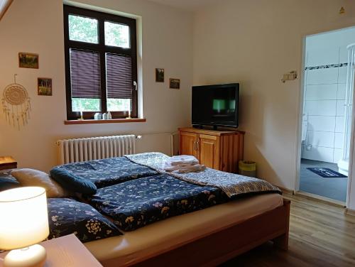 Postel nebo postele na pokoji v ubytování SPA Pod Javory