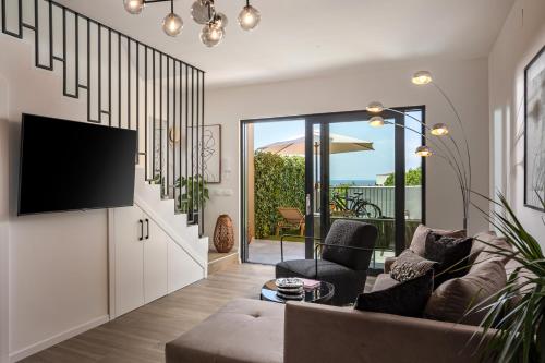 Elegant CASA ARIA with 2 gardens and BBQ facilities