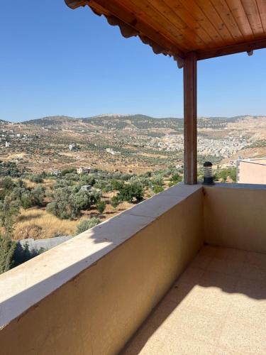 a view from the balcony of a house at Rooooz in Jerash