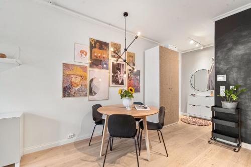 a dining room with a table and chairs at Arctic City Studio - perfectly located in the main street in Tromsø