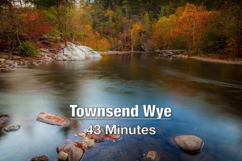 a river with the words minutes at New Luxury Cabin with Stunning MountainVIEWS,HotTub, FirePit, FirePlace,2 KingBeds, 2 CoveredDecks,BBqGrill, ShuffleBoard and Pool Access in Sevierville