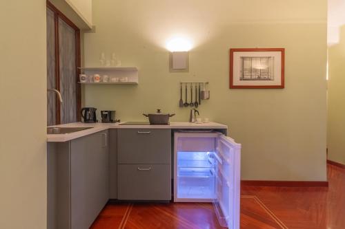 Η κουζίνα ή μικρή κουζίνα στο Daisy Home