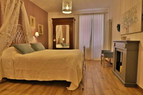 Ένα ή περισσότερα κρεβάτια σε δωμάτιο στο La Casa di Livia