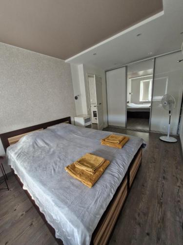 Postel nebo postele na pokoji v ubytování Tallinna mnt 15 Apartament