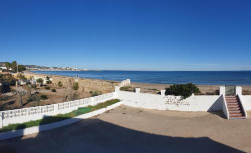 a view of the beach from the roof of a building at Vacansis Habitaciones Privada en una Villa a un paso del Mar en Cullera in Cullera