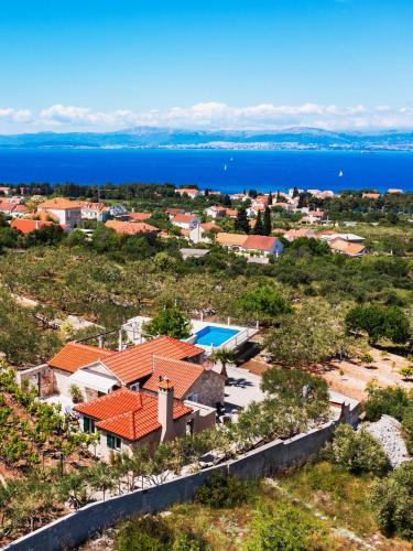 an aerial view of a house and the ocean at VILLA AGAPE - Three bedroom villa on 15k m2 olive grove - Incredible 360 view - Free parking - Private pool and jacuzzi in Mirce
