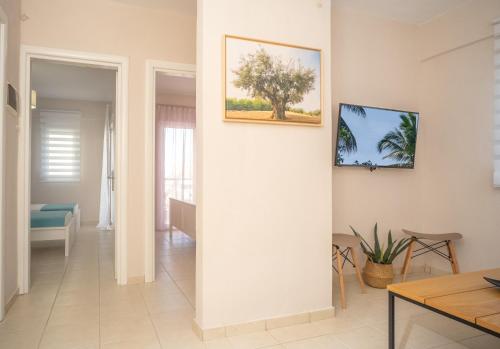 TV a/nebo společenská místnost v ubytování Cozy Home