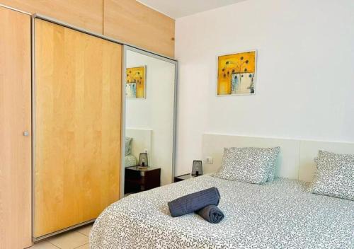 Ένα ή περισσότερα κρεβάτια σε δωμάτιο στο Ground-Floor 1 bedroom condoPool &Wifi Costa Adeje