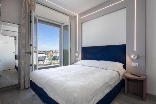 Postel nebo postele na pokoji v ubytování Hotel Niagara