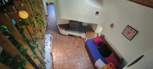 an overhead view of a living room with a fireplace at Le gîte des Roussels in Rousses