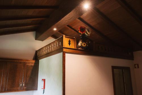 a room with a shelf with a vase on it at Quinta da Malhada in Cabril