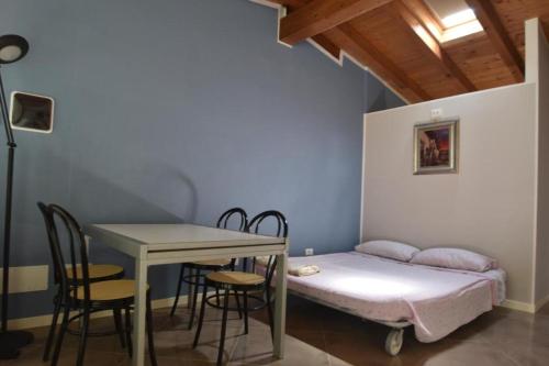 Postel nebo postele na pokoji v ubytování Akihouse by Mauro