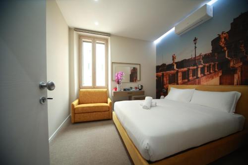 Una cama o camas en una habitación de Vacanze Romane Vaticano