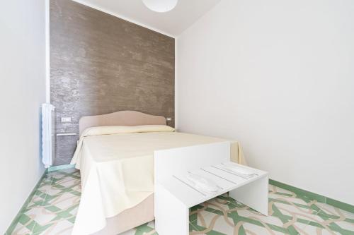 Ένα ή περισσότερα κρεβάτια σε δωμάτιο στο Casa Ferdimena