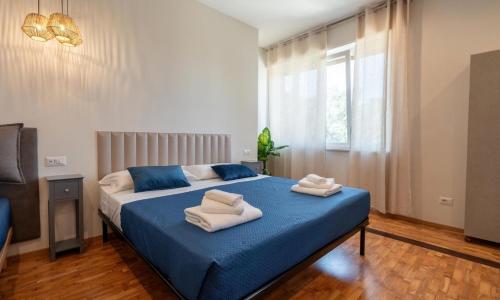 Postel nebo postele na pokoji v ubytování Namuri Comfortable Rooms
