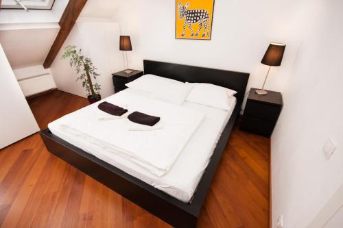 Postel nebo postele na pokoji v ubytování Luxury Loft