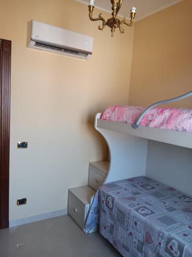 Ένα ή περισσότερα κρεβάτια σε δωμάτιο στο Casa Adelaide