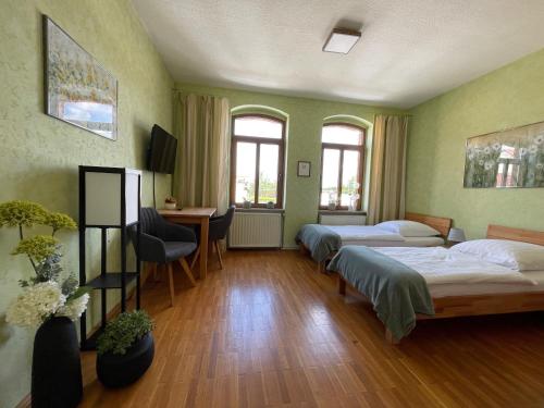 Ένα ή περισσότερα κρεβάτια σε δωμάτιο στο Maisonette Salzknecht