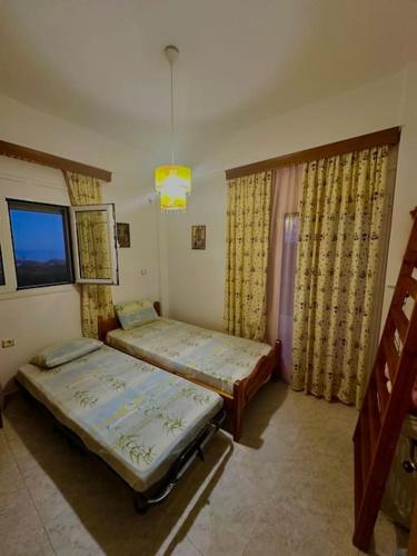 Ένα ή περισσότερα κρεβάτια σε δωμάτιο στο Panoramic Elia Apartment