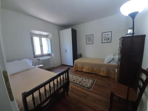 Ένα ή περισσότερα κρεβάτια σε δωμάτιο στο Villa Chiatri