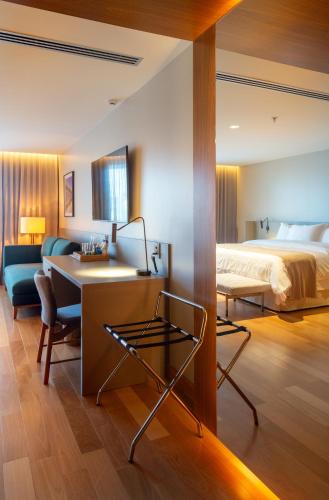 Cama ou camas em um quarto em Monã Hotel
