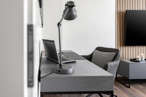 TV a/nebo společenská místnost v ubytování Design Apartment - Küche - Komfort - Zentral