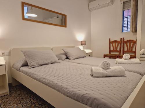 Posteľ alebo postele v izbe v ubytovaní Beachfront Apartment