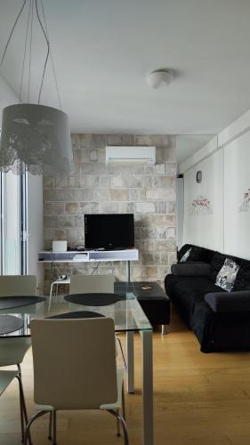 Μια τηλεόραση ή/και κέντρο ψυχαγωγίας στο Apartment Pržno