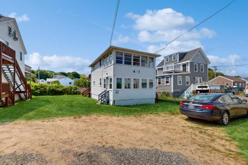 a house with a car parked in front of it at Pearly Shores in York