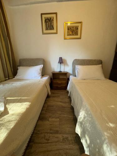 Кровать или кровати в номере Classic apartment Meronas